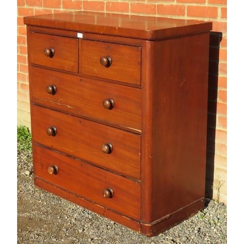 924 - A Victorian mahogany chest of two short over three long graduated drawers with turned wooden knob ha... 