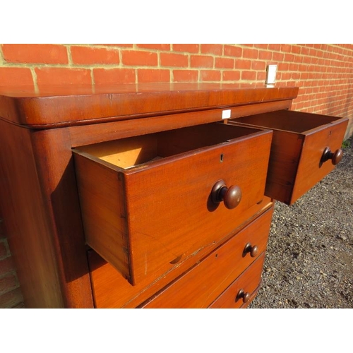 924 - A Victorian mahogany chest of two short over three long graduated drawers with turned wooden knob ha... 