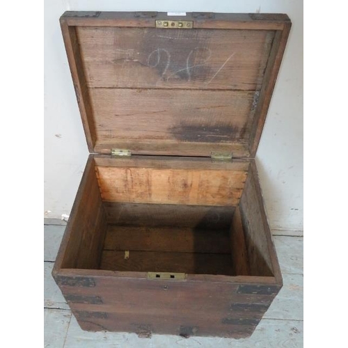 926 - A 19th century oak metal bound strong box with handles to either side. Bears remnants of historic la... 