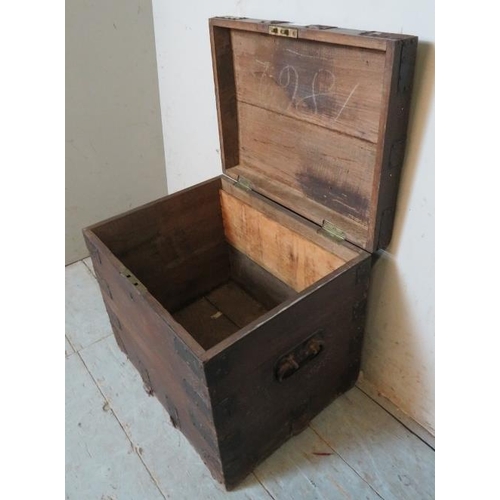 926 - A 19th century oak metal bound strong box with handles to either side. Bears remnants of historic la... 