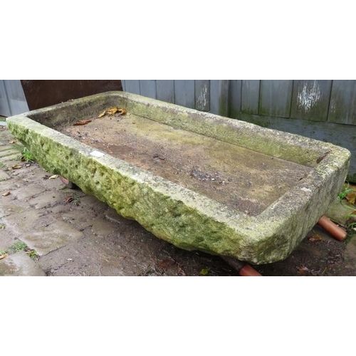 943 - A large heavy nicely weathered stone sink.
Condition report: Loss to one corner. Base has been fille... 