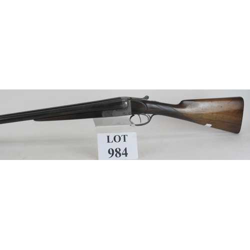 984 - 12 bore side by side, boxlock ejector, double trigger, 25 1/4 barrels, 14 1/4 stock. Barrels inscrib... 