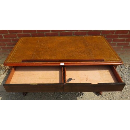 889 - A Victorian architect's desk with adjustable drawing surface, inset with brown tooled leather over a... 