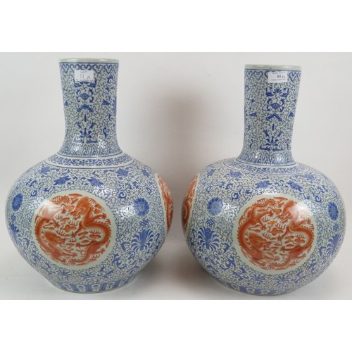 11 - A pair of large Chinese porcelain 'Tianqiuping' bottle vases, probably 20th Century each decorated i... 