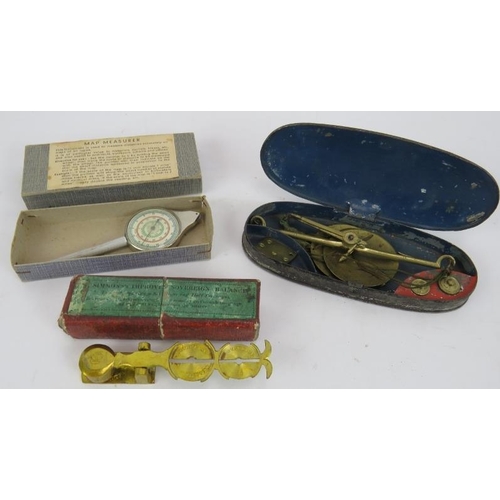 101 - A set of Victorian Simmons Sovereign scales, a set of brass pocket scales in a toleware case and a 1... 