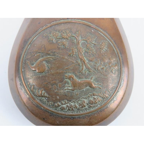 102 - A 19th century copper powder flask with hunting scene panel, a 19th century leather shot flask stamp... 