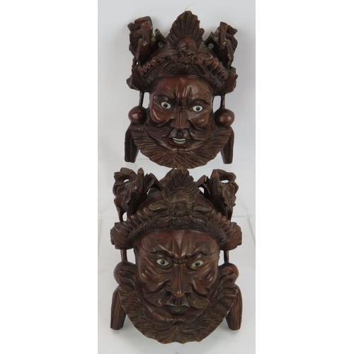 103 - Seven carved wood oriental figures including two Chinese Deities with polychrome decoration plus two... 