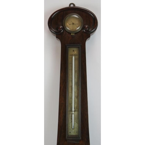 106 - A 19th century wheel barometer maker Barrett, Bromley St Commercial Street East. Silvered dial, maho... 