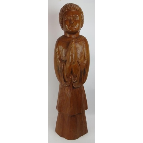 111 - A large hardwood chip carved figure of a chorister praying. Height 95cm.
Condition report: Natural s... 