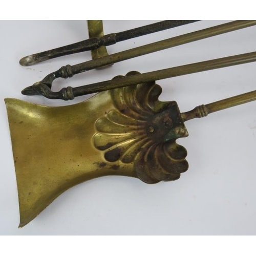 115 - A three piece antique brass fire iron set and a pair of similar brass andirons (5).
Condition report... 