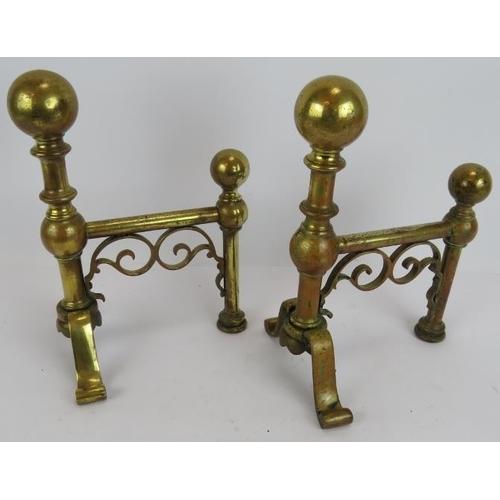 115 - A three piece antique brass fire iron set and a pair of similar brass andirons (5).
Condition report... 