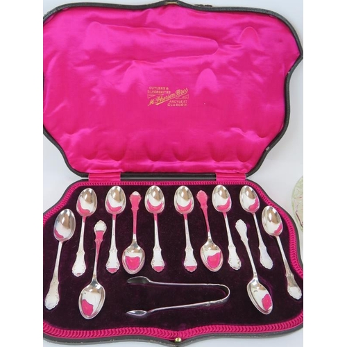 119 - A silver plated cased grape & nut set by Walker & Hall, a cased set of 12 teaspoons & tongs, a cut g... 