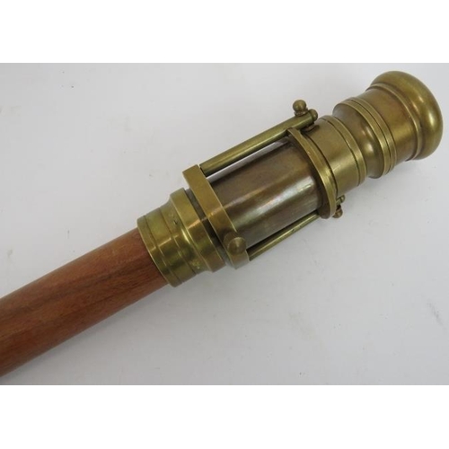 125 - A contemporary telescope walking stick. Hardwood shaft mounted with folding brass telescope. Length ... 