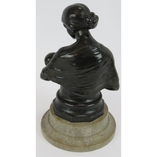 134 - A bronzed Spelter figure of a mother & child mounted on a turned marble base. Height 19cm.
Condition... 