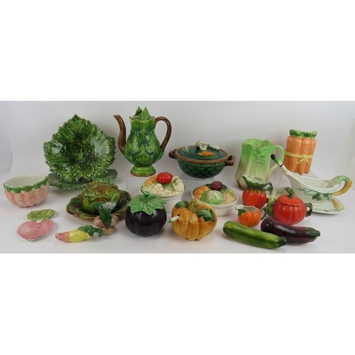 144 - A quantity of vegetable shaped table ware including a coffee pot, cruets and covered dishes (qty).
C... 