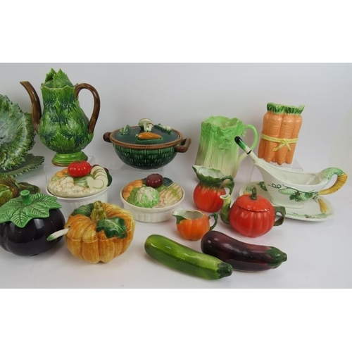 144 - A quantity of vegetable shaped table ware including a coffee pot, cruets and covered dishes (qty).
C... 