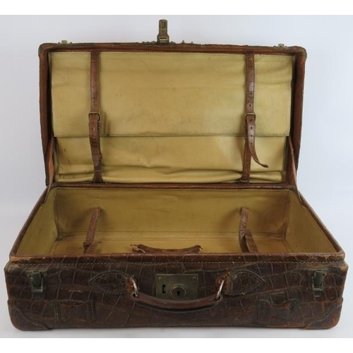 156 - A good quality vintage crocodile skin suitcase with full pigskin lining, internal straps and brass f... 