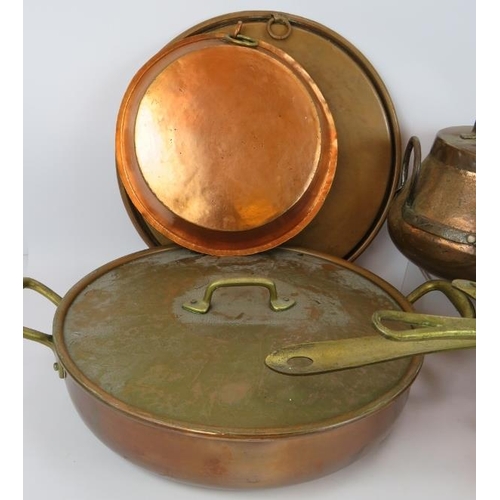 157 - A large quantity of good quality copper and brass cooking pans and jugs, 15 different items in total... 