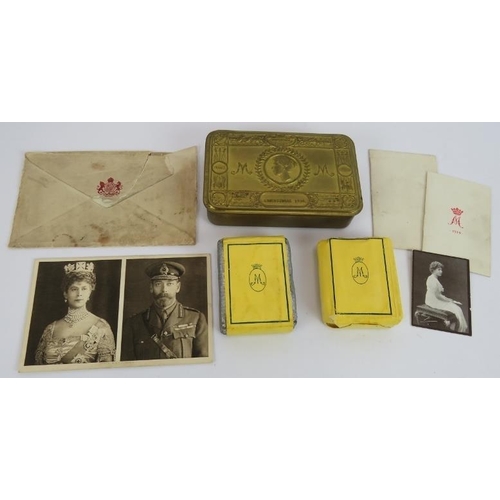 16 - A Princess Mary Christmas 1914 tin containing cigarettes, tobacco, Christmas card and photograph, pl... 