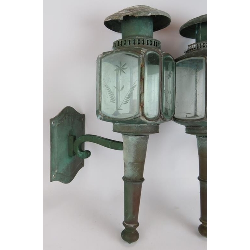 173 - A pair of vintage carriage style lanterns with heavily patinated exteriors. Height 50cm. (pr).
Condi... 