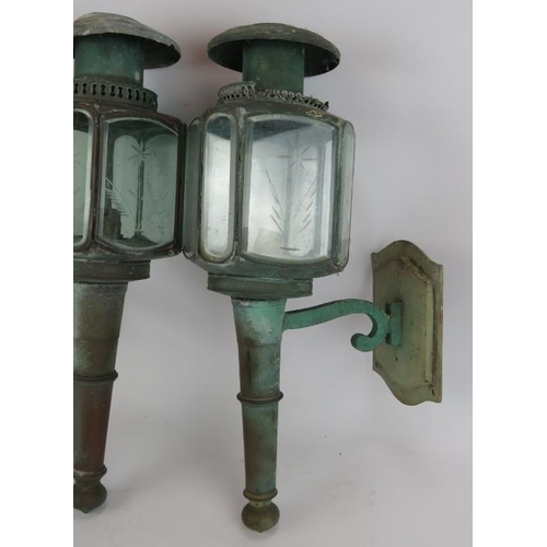 173 - A pair of vintage carriage style lanterns with heavily patinated exteriors. Height 50cm. (pr).
Condi... 