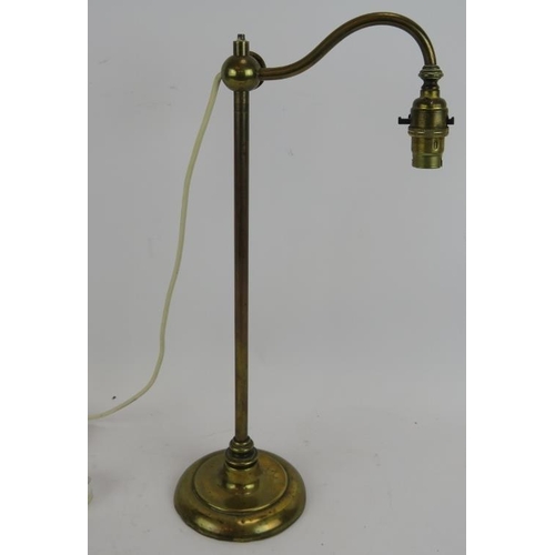 177 - An early antique brass rise and fall desk lamp with filled lead base. Height 45cm.
Condition report:... 