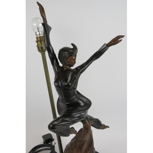 178 - An Art Deco style bronzed lamp in the form of a leaping dancer. Height 55cm.
Condition report: Untes... 