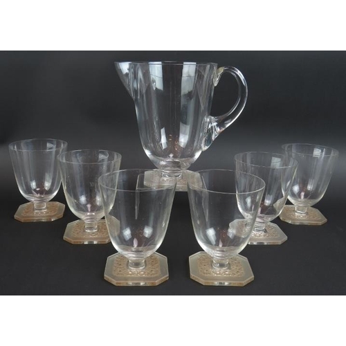 18 - A seven piece glass & jug set by Rene Lalique in Paquerette pattern, model number 5329, circa 1935, ... 