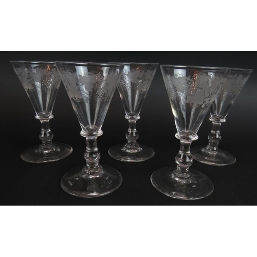 19 - Eleven mixed ornately engraved 19th century glasses including a Queen Victoria monogrammed wine glas... 