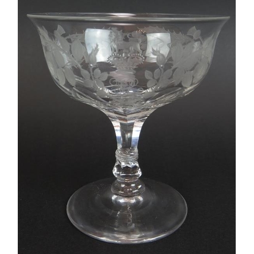 19 - Eleven mixed ornately engraved 19th century glasses including a Queen Victoria monogrammed wine glas... 