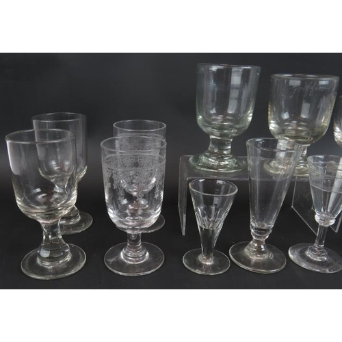 20 - Fourteen mixed 19th century drinking glasses including various rummers, an ale glass, and an engrave... 