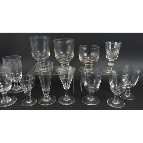 20 - Fourteen mixed 19th century drinking glasses including various rummers, an ale glass, and an engrave... 