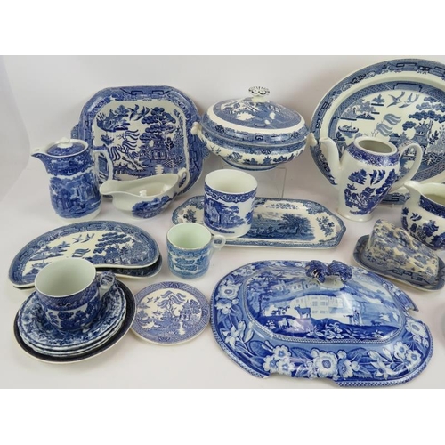 204 - A large quantity of mainly Willow Patter blue and white table ware, various ages and makers. (qty).
... 