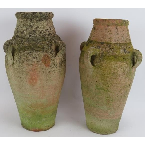 209 - A pair of small antique hand thrown amphoras well weathered. Tallest 43cm. (2).
Condition report: Ch... 