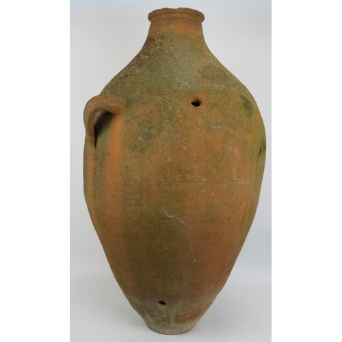 210 - A large antique hand thrown amphora of some considerable age. Height 90cm.
Condition report: One han... 