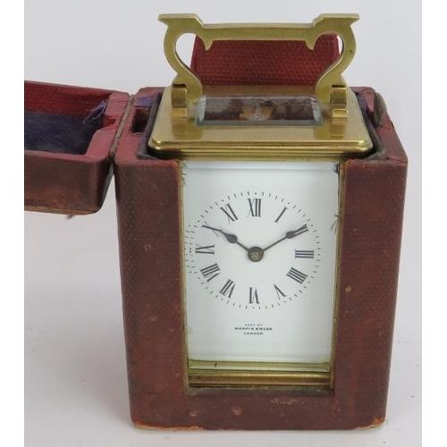 219 - A Mappin and Webb brass cased 8 day carriage clock with carry case and key. Height 15cm.
Condition r... 