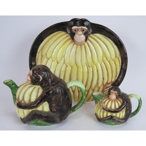 222 - A four piece Safari by Department 56, chimpanzee and banana figural tea set at Gruet. Plate 31cm x 2... 