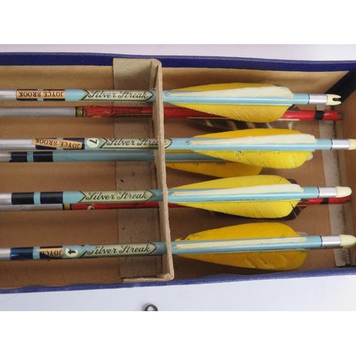 225 - A vintage 1950s long bow and box of Silver Streak arrows plus various archery badges and medals. Bow... 