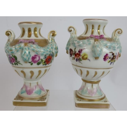 238 - A small pair of Meissen porcelain urns, a Campana shaped Copeland spill vase with game bird decorati... 