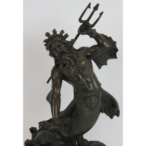 243 - A contemporary bronze figure of Neptune holding a trident mounted on a black marble plinth. Signed B... 