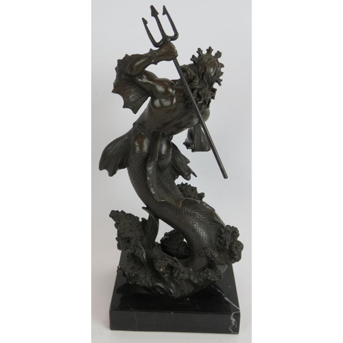 243 - A contemporary bronze figure of Neptune holding a trident mounted on a black marble plinth. Signed B... 