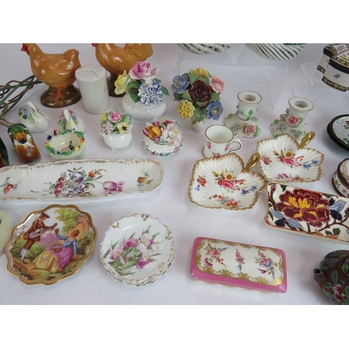 249 - A collection of small mainly porcelain boxes, dishes and ornaments including two Italian cherry bask... 