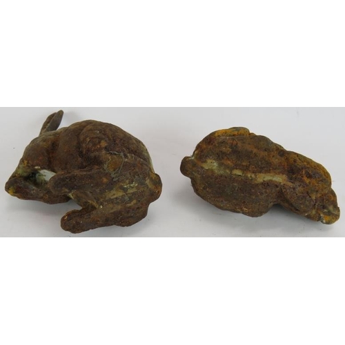 263 - A small pair of antique cast iron figures of hares, each with lead joins. Tallest 19cm.
Condition re... 