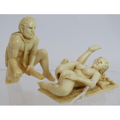 272 - A Japanese Meiji period two-piece ivory erotic carving in the ancient Grecian taste, signed, depicti... 