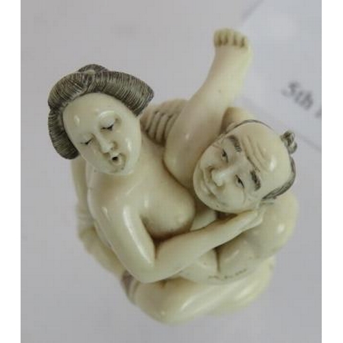 274 - A Japanese Meiji period signed ivory erotic carving, depicting a couple copulating, height 4.5cm.Pro... 