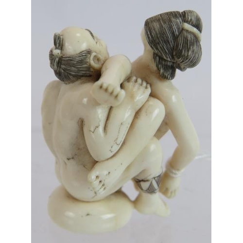 274 - A Japanese Meiji period signed ivory erotic carving, depicting a couple copulating, height 4.5cm.Pro... 