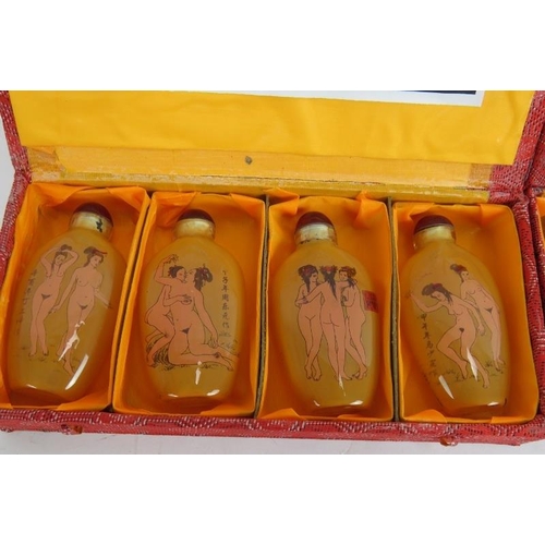 284 - A set of 8 Chinese erotic inside-painted glass snuff bottles, contained within 2 boxes, 20th Century... 