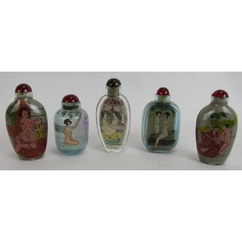 285 - Five Chinese erotic inside-painted glass snuff bottles, 20th Century, depicting naked figures and co... 