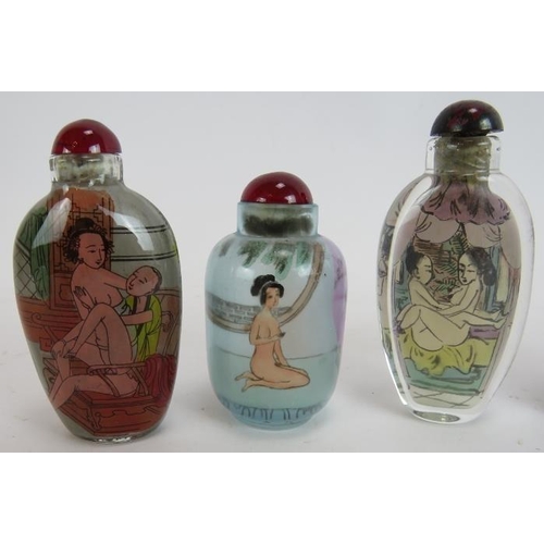 285 - Five Chinese erotic inside-painted glass snuff bottles, 20th Century, depicting naked figures and co... 