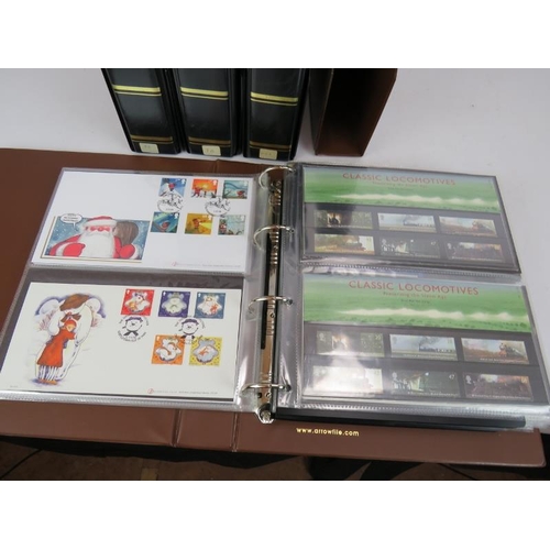 293 - An impressive 6 album collection of mainly UK first day covers, PHQ cards and mint stamp sets. Some ... 